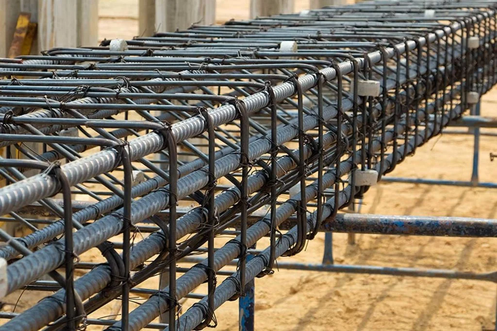 Long line of prefabricated reinforcement cages with bar chairs